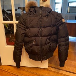 Moncler Puffer with Raccoon fur trim hood.